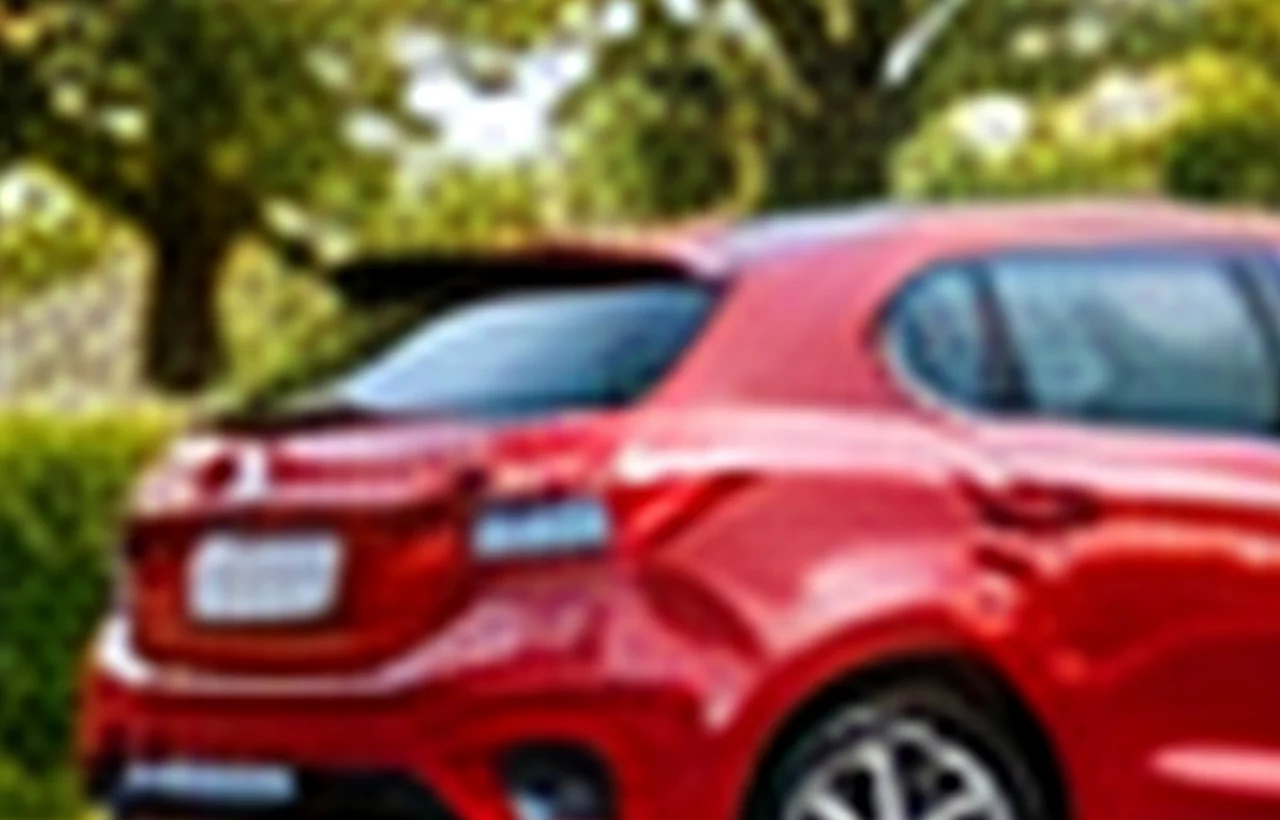 Retired Canadian woman test-driving a compact SUV at a dealership in winter