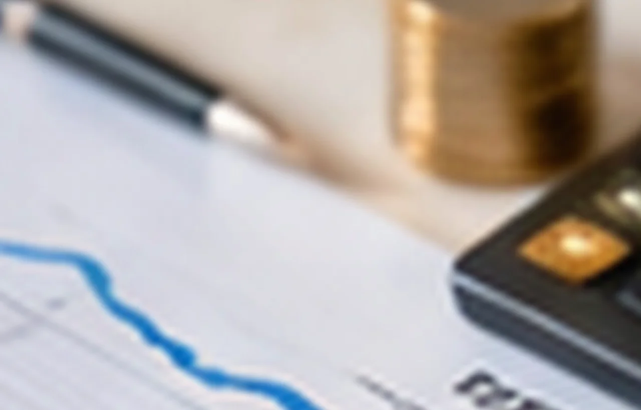 Self-employed consultant in his late fifties preparing accounts for a bank