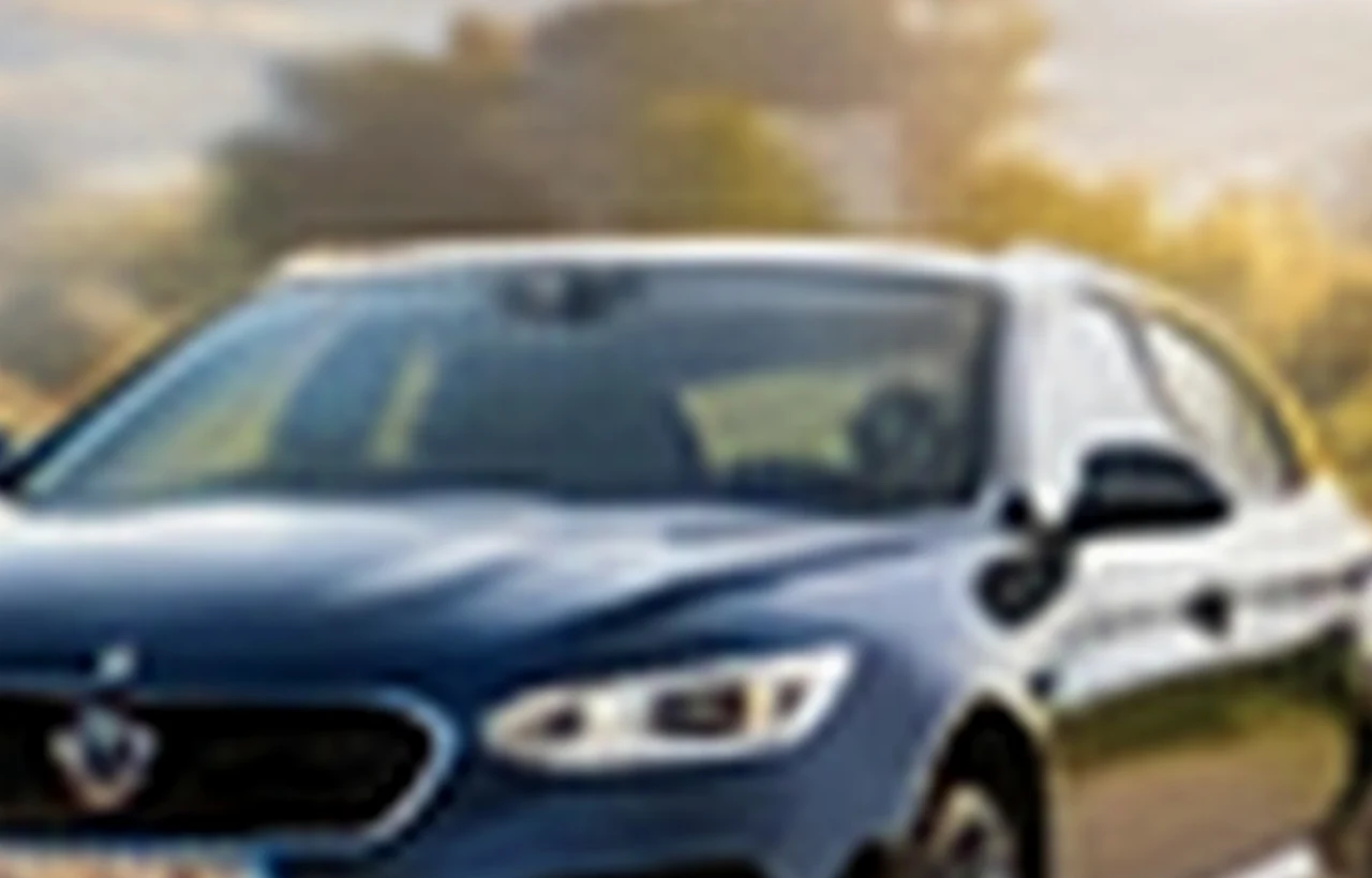 Retired man collecting the keys to a leased new car from a dealer